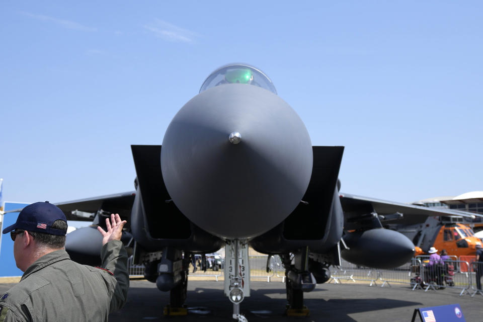 FILE - A F-15E Strike Eagle fighter jet is on display at the Farnborough Air Show fair in Farnborough, England, Monday, July 18, 2022. The future for fighter pilots was on display at the Farnborough International Airshow near London, one of the world’s biggest aviation, defense and aerospace expos. New technologies take on a bigger role in the cockpit, redefining what it means to be a ''Top Gun''. (AP Photo/Frank Augstein, File)