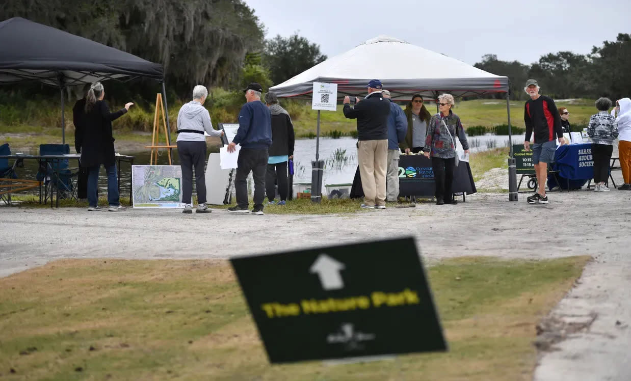 Conservation organizations welcome guests to the new Nature Park at Bobby Jones Golf Course on reopening day, Dec. 15.