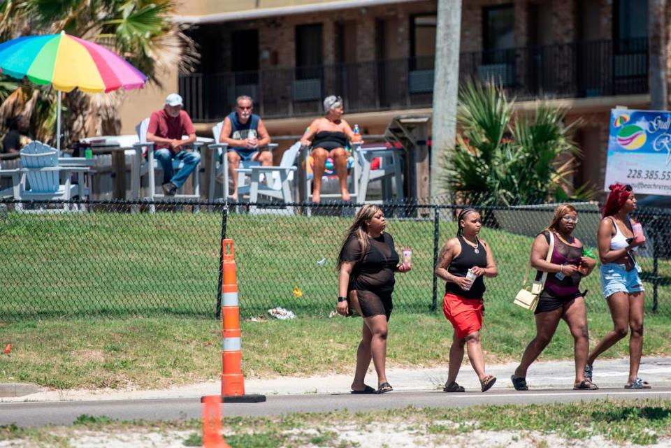 Spring breakers cross Highway 90 in Biloxi to get to the beach during Black Spring Break on Saturday, April 13, 2024. The city of Biloxi denied a special events permit in part because of safety concerns.