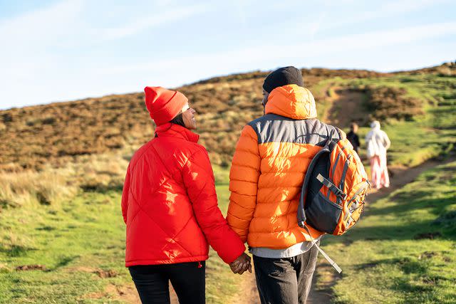 <p>Getty</p> A stock photo of a couple walking outside