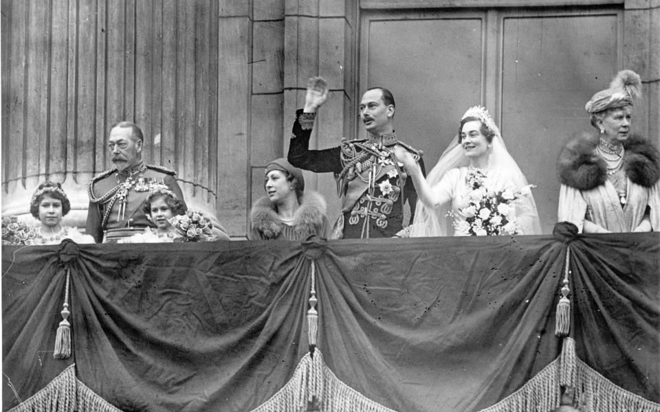 The scene at Buckingham Palace showing the Royal Party on the balcony after the wedding of the Duke of Gloucester and Lady Alice Scott - AP