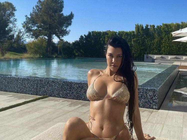 Kourtney Kardashian shows off backyard.