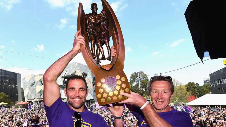 Pictured here, Storm captain Cameron Smith and coach Craig Bellamy with the NRL trophy.