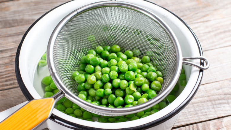 Peas in strainer