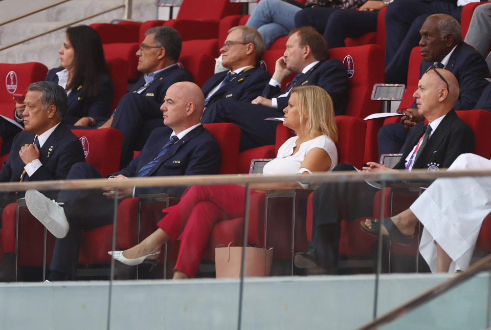 Soccer Football - FIFA World Cup Qatar 2022 - Group E - Germany v Japan - Khalifa International Stadium, Doha, Qatar - November 23, 2022 German Interior Minister Nancy Faeser is seen wearing the OneLove armband alongside German Football Association president Bernd Neuendorf and FIFA president Gianni Infantino REUTERS/Kai Pfaffenbach