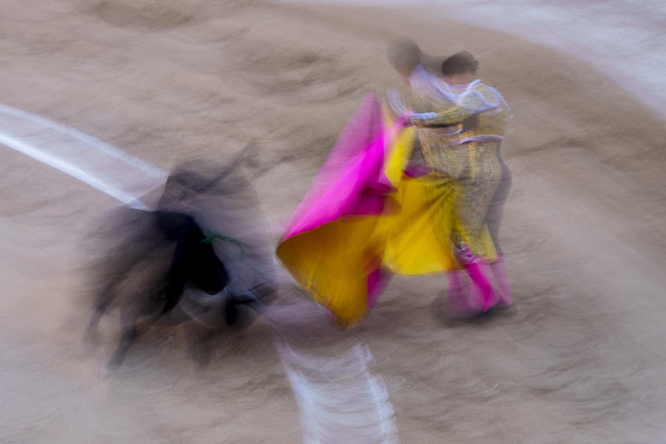 French bullfighter Yon Lamothe performs during a bullfight with young bulls at Las Ventas bullring in Madrid, Spain, Sunday, March 26, 2023. The death of Spanish bullfighting has been declared many times, but the number of bullfights in the country is at its highest level in seven years, and the young are the most consistent presence as older groups of spectators drop away. (AP Photo/Manu Fernandez)