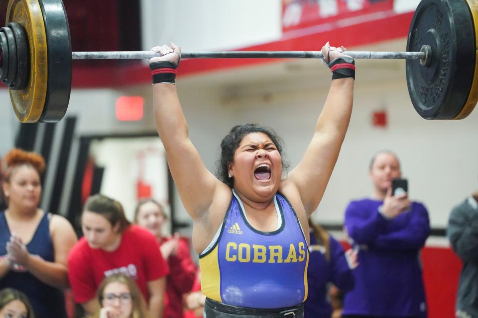 Fort Pierce Central's Ana Amador lifts 180 pounds in the clean-and-jerk event during the District 13-3A girls weightlifting meet Saturday, Jan. 22. 2022, at Vero Beach High School.