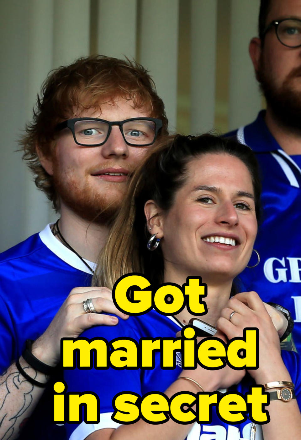 Picture of Ed and Cherry at a sports game labeled "got married in secret"
