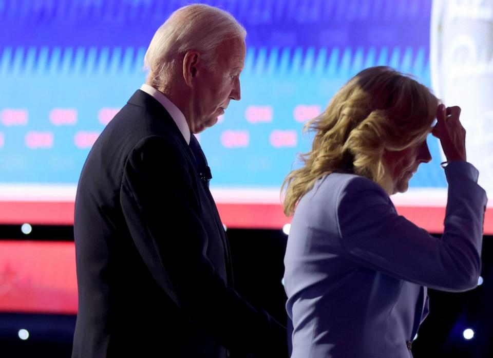 PHOTO: President Joe Biden walks off with first lady Jill Biden following the CNN Presidential Debate at the CNN Studios in Atlanta, GA, June 27, 2024. (Justin Sullivan/Getty Images)