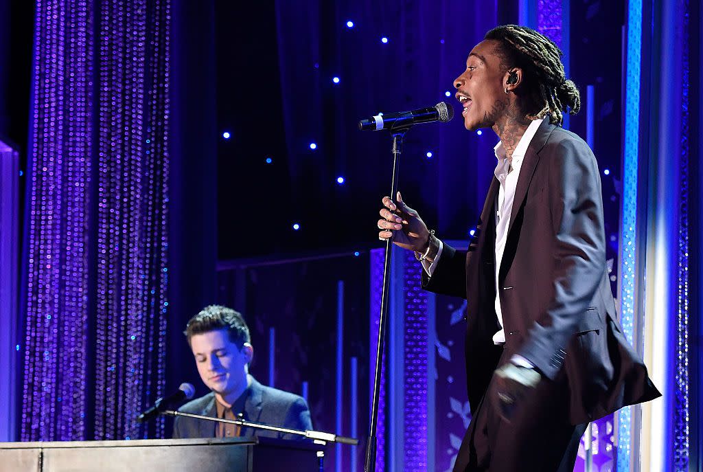 Hollywood Song Award honorees Charlie Puth (L) and Wiz Khalifa perform onstage during the 19th Annual Hollywood Film Awards at The Beverly Hilton Hotel on November 1, 2015 in Beverly Hills, California.