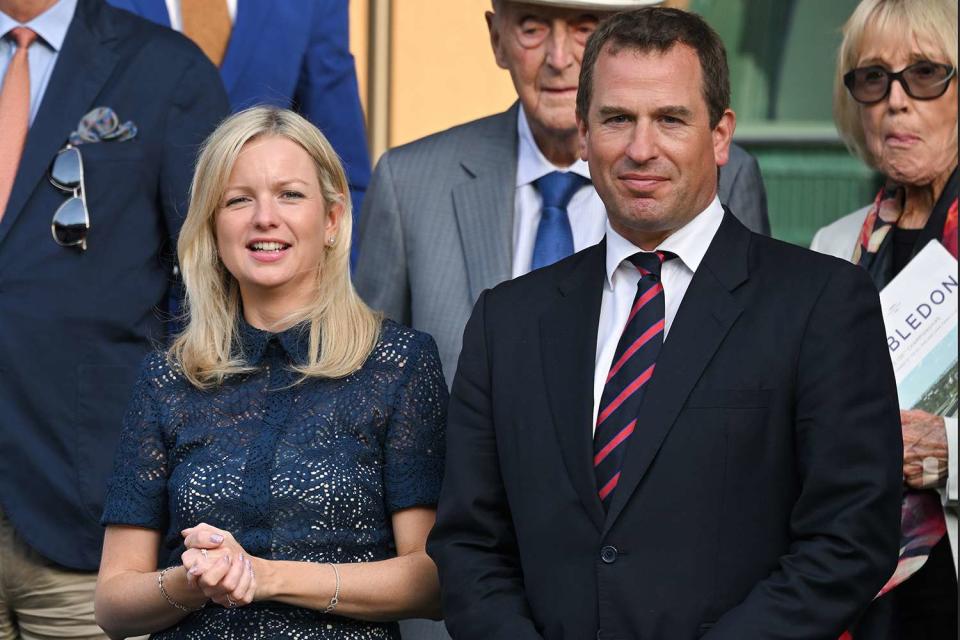 <p>Karwai Tang/WireImage</p> Lindsay Wallace and Peter Phillips attend Wimbledon in July 2022