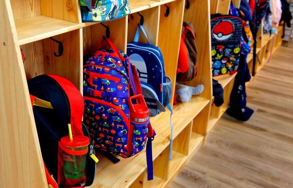 Backpacks hang on a wall cubby at Level Up Learning preschool in Kennewick. Bob Brawdy/bbrawdy@tricityherald.com