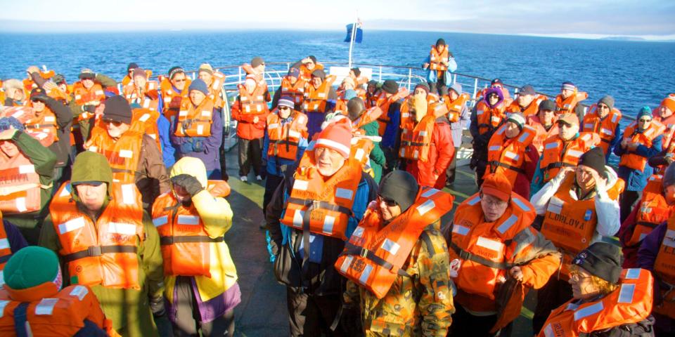 Cruise North Expedition passengers during a lifeboat drill in the Northwest Passage, Nunavut, Arctic Canada.