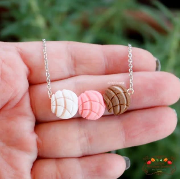 <a href="https://fave.co/3c2UPtU" target="_blank" rel="nofollow noopener noreferrer">CBJ by Lorena</a> is a California-based Latinx-owned Etsy shop that specializes in colorful clay jewelry like conchas and florals. Shop this <a href="https://fave.co/2ZGre4f" target="_blank" rel="nofollow noopener noreferrer">Concha Charm Necklace in color for $17</a> at <a href="https://fave.co/3c2UPtU" target="_blank" rel="nofollow noopener noreferrer">CBJ by Lorena on Etsy.</a>