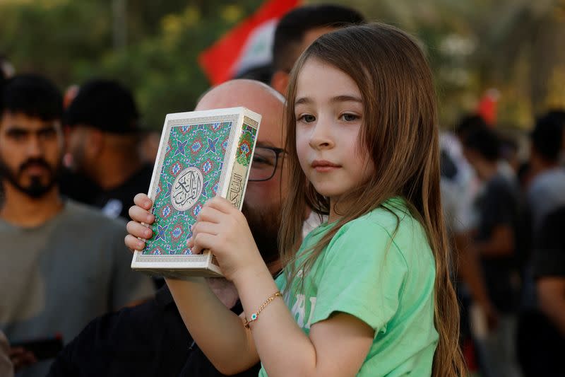 Iraqis demonstrate against the desecration of the Koran in Sweden, in Baghdad