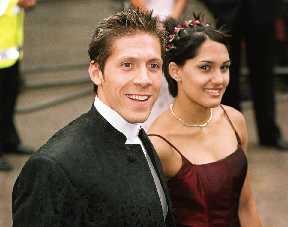 Stuntman Ray Park who plays the evil character of Darth Maul in the new Star Wars Film attends the premiere of "The Phantom Menace" in London's Leicester Square on July 14, 1999, accompanied by an unidentified woman.