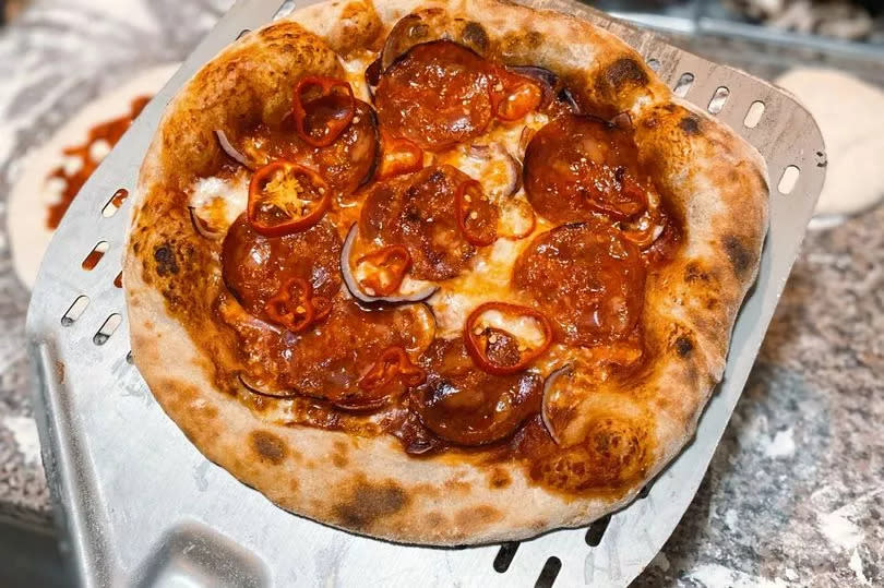 The pizzas at The Side by Side are baked in a special oven -Credit:The Side by Side