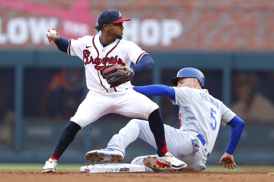 ATLANTA, GA - MAY 24: Freddie Freeman #5 of the Los Angeles Dodgers is out at second as Ozzie Albies #1 of the Atlanta Braves makes the play during the first inning at Truist Park on May 24, 2023 in Atlanta, Georgia. (Photo by Todd Kirkland/Getty Images)