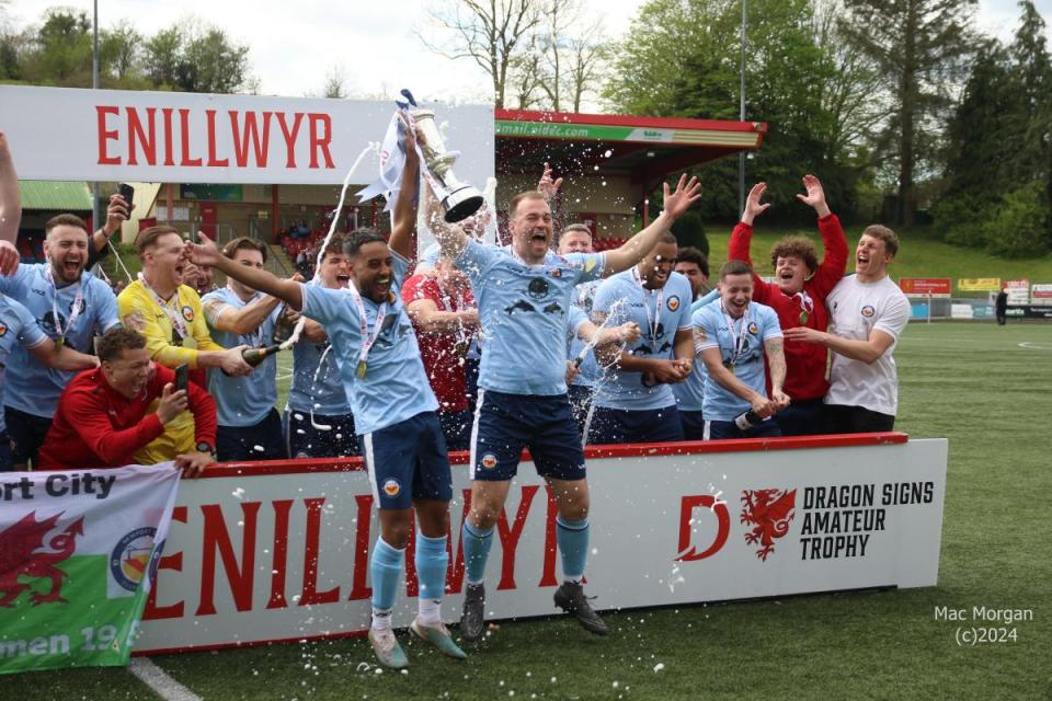 DELIGHT: Newport City celebrate winning the FAW Amateur Trophy <i>(Image: MAC MORGAN)</i>