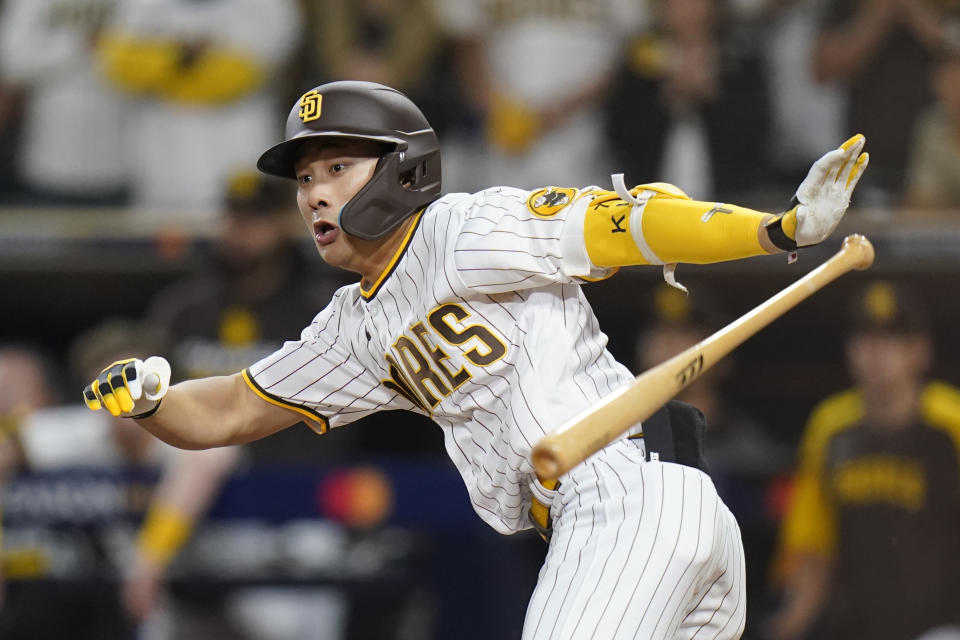 FILE - San Diego Padres' Ha-Seong Kim watches his RBI double during the seventh inning in Game 4 of a baseball NL Division Series against the Los Angeles Dodgers, on Oct. 15, 2022, in San Diego. (AP Photo/Jae C. Hong, File)