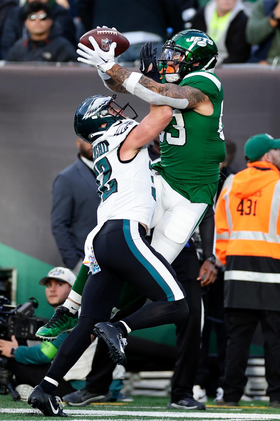 Philadelphia Eagles' Reed Blankenship, left, breaks up a pass intended for New York Jets' Tyler Conklin during the first half of an NFL football game, Sunday, Oct. 15, 2023, in East Rutherford, N.J.