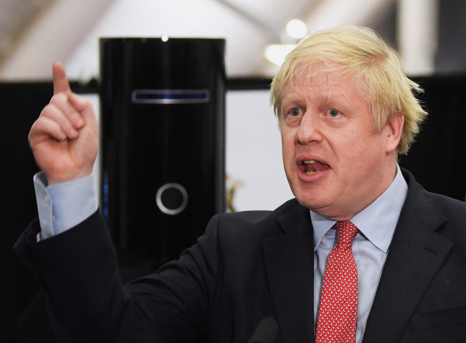 Conservatives' British Prime Minister Boris Johnson gestures while speaking after winning his seat at the counting centre in Britain's general election in Uxbridge, Britain, December 13, 2019. REUTERS/Toby Melville     TPX IMAGES OF THE DAY