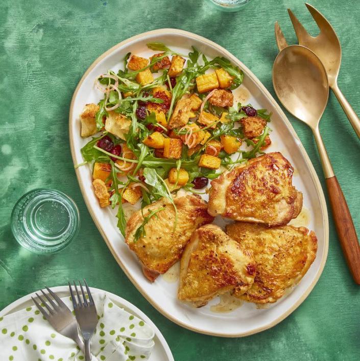 <p>This golden chicken tastes even better with roasted squash by its side.</p><p><u><em><a href="https://www.womansday.com/food-recipes/food-drinks/recipes/a60791/roasted-chicken-and-squash-panzanella-recipe/" rel="nofollow noopener" target="_blank" data-ylk="slk:Get the recipe for Roasted Chicken and Squash." class="link rapid-noclick-resp">Get the recipe for Roasted Chicken and Squash.</a></em></u></p>