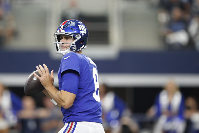 Teammates tip their helmets to Daniel Jones