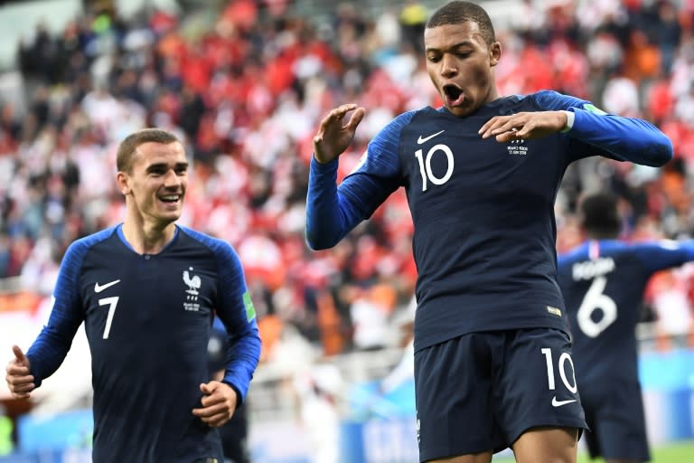 France's Kylian Mbappe (R) celebrates his goal against Peru at the World Cup
