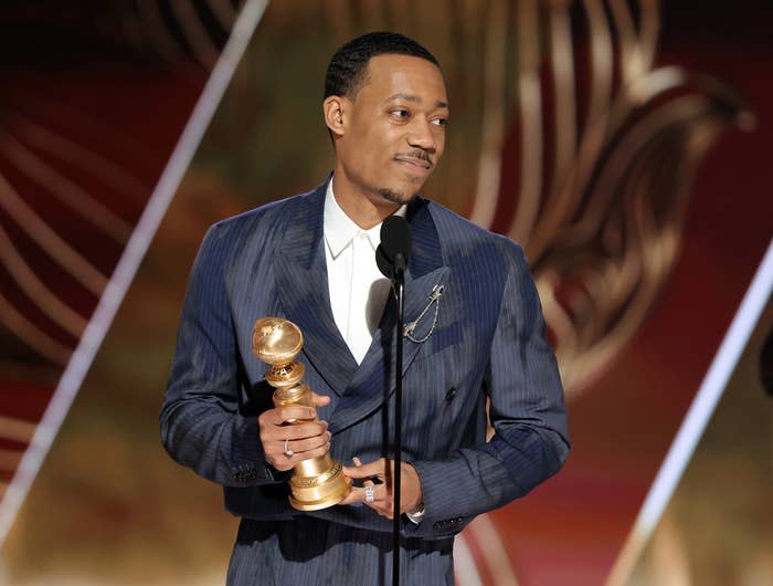 Tyler James Williams accepts the Best Performance by an Actor in a Supporting Role in a Musical-Comedy or Drama Television Series award for Abbott Elementary&nbsp;at the 80th Annual Golden Globe Awards on January 10, 2023, in Beverly Hills, California.