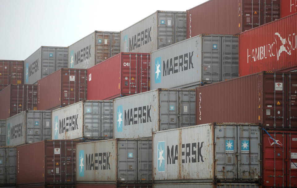 Shipping containers are seen stacked at a former airfield, now a business park, in the village of Eye near Diss, Britain, November 3, 2021.  REUTERS/Peter Nicholls