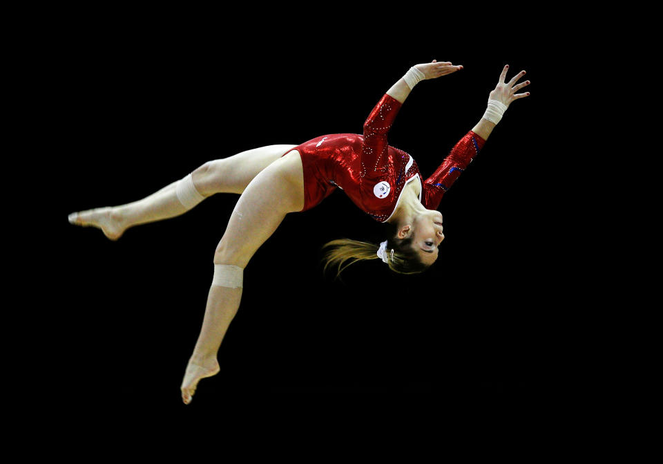 Youna Dufournet, 18, of France in action on the uneven bars during the Women's Artistic Gymnastics Olympic Qualification round at North Greenwich Arena on January 11, 2012 in London, England. (Photo by Paul Gilham/Getty Images)