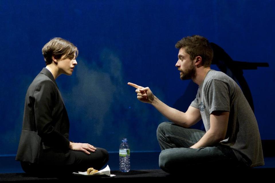 In this theater image released by The Hartman Group, Olivia Thirlby, left, and Topher Grace are shown during a performance of "Lonely I'm Not," in New York. (AP Photo/The Hartman Group, Joan Marcus)