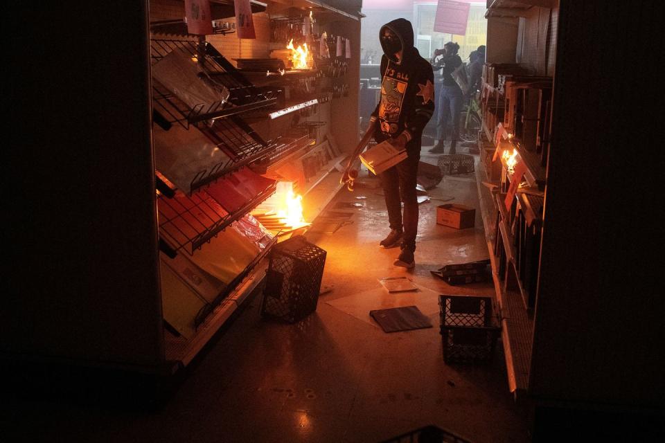 <p>A young man starts fires inside a store near the Minneapolis Police Department’s Fifth Precinct building. </p>