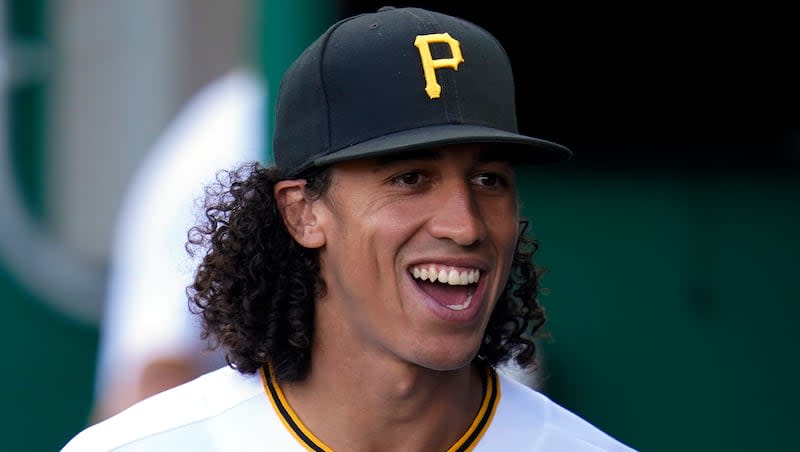 Pittsburgh Pirates' Cole Tucker walks in the dugout before a baseball game against the Washington Nationals in Pittsburgh, Thursday, April 14, 2022.