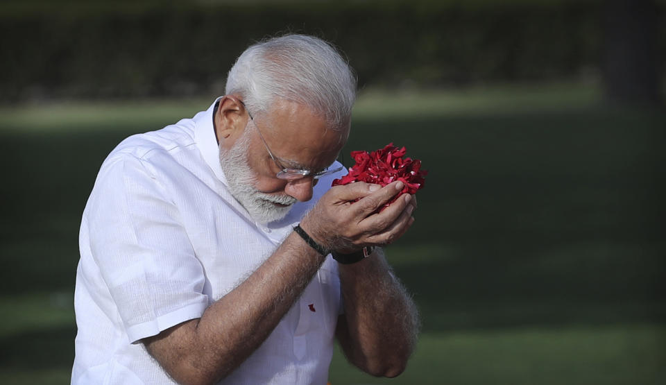 Indian Prime Minister Narendra Modi pays tributes at Rajghat, the memorial to Mahatma Gandhi, before being sworn in for his second term as Indian prime minister today evening in New Delhi, India, Thursday, May 30, 2019. India's president on Saturday appointed Modi as the prime minister soon after newly-elected lawmakers from the ruling alliance, led by the Hindu nationalist Bharatiya Janata Party, elected him as their leader after a thunderous victory in national elections. (AP Photo/Manish Swarup)