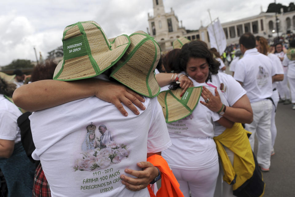 Pilgrims embrace in Portugal