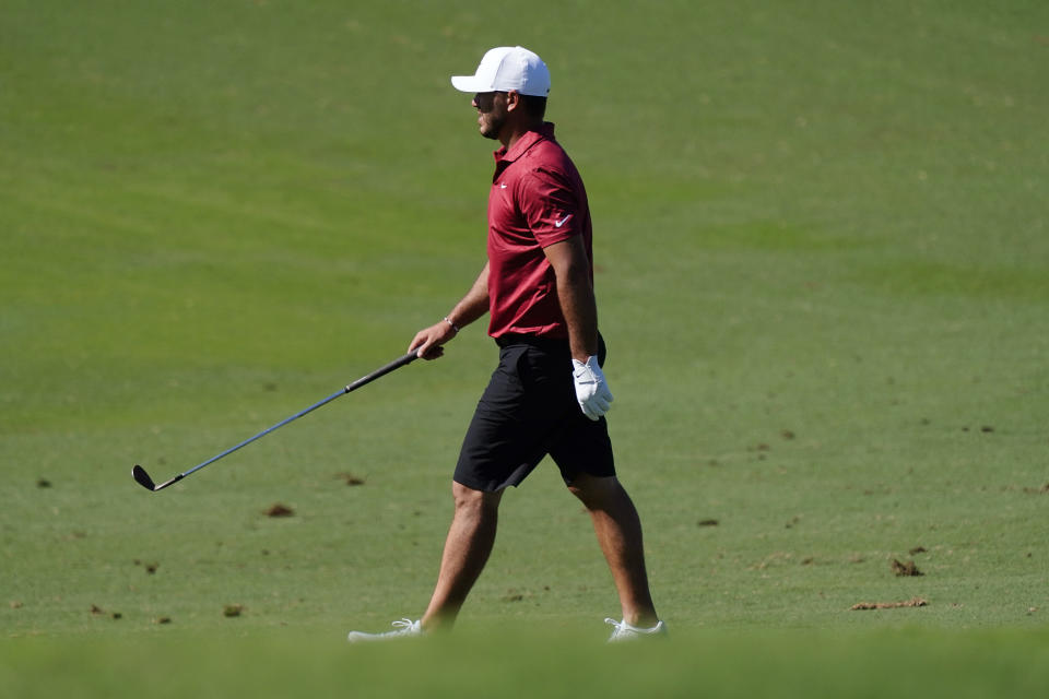 Brooks Koepka walk up the 13th fairway during the Tournament of Champions pro-am team play golf event, Wednesday, Jan. 5, 2022, , at Kapalua Plantation Course in Kapalua, Hawaii. (AP Photo/Matt York)