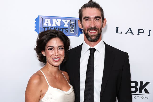 <p>Image Press Agency/NurPhoto/Shutterstock </p> Phelps with wife Nicole [L]