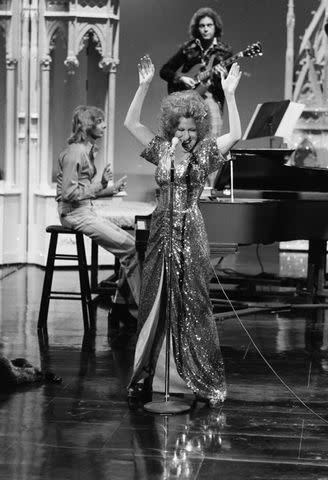 <p>Fred Sabine/NBCU Photo Bank/NBCUniversal via Getty</p> Barry Manilow accompanying Bette Midler on The Tonight Show Starring Johnny Carson in 1973