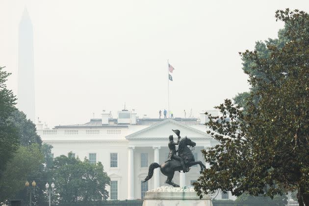 The White House is seen Thursday through hazy skies caused by smoke from Canadian wildfires. The Washington area is under a Code Purple air quality alert, indicating unhealthy air for all members of the public.