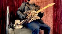Guy Builds Guitar from Uncle's Skeleton