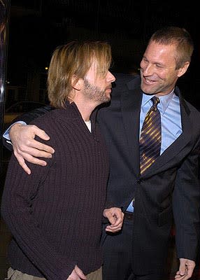 David Spade and Aaron Eckhart at the LA premiere of Paramount's Paycheck