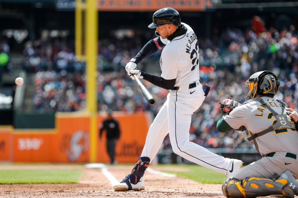 Detroit Tigers center fielder Parker Meadows bats against Oakland Athletics during the third inning of the home opening day at Comerica Park in Detroit on Friday, April 5, 2024.