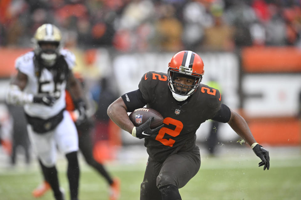 Cleveland Browns wide receiver Amari Cooper (2) rushes for a first down during the first half of an NFL football game against the New Orleans Saints, Saturday, Dec. 24, 2022, in Cleveland. (AP Photo/David Richard)