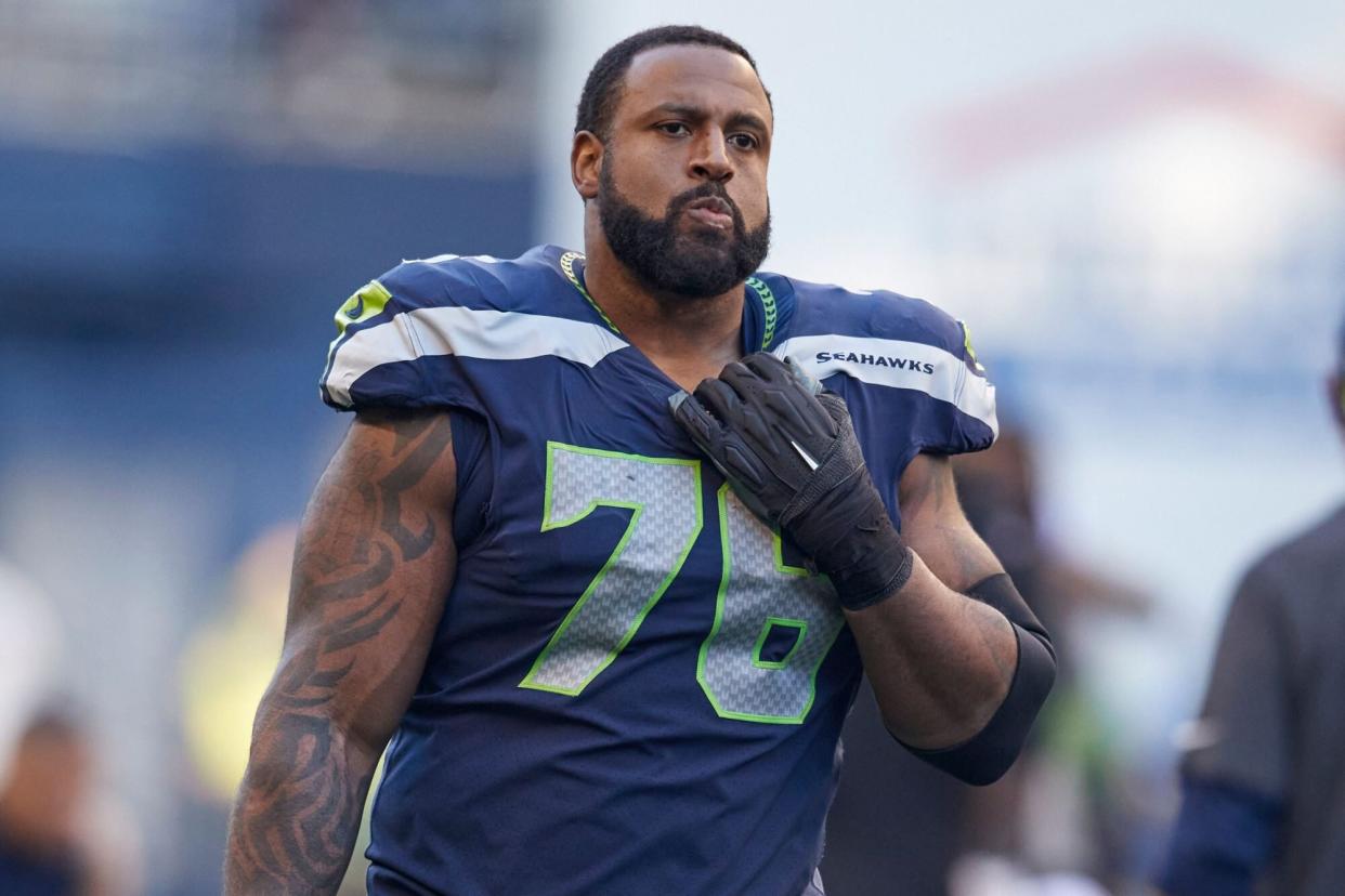 Mandatory Credit: Photo by John Froschauer/AP/Shutterstock (12581347iy) Seattle Seahawks offensive tackle Duane Brown walks off the field with his helmet off after playing the Jacksonville Jaguars in an NFL football game, in Seattle Jaguars Seahawks Football, Seattle, United States - 31 Oct 2021