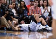 Nov 28, 2015; Dallas, TX, USA; Dallas Mavericks guard Deron Williams (8) falls to the court after being fouled during the second half against the Denver Nuggets at the American Airlines Center. The Mavericks defeat the Nuggets 92-81. Mandatory Credit: Jerome Miron-USA TODAY Sports