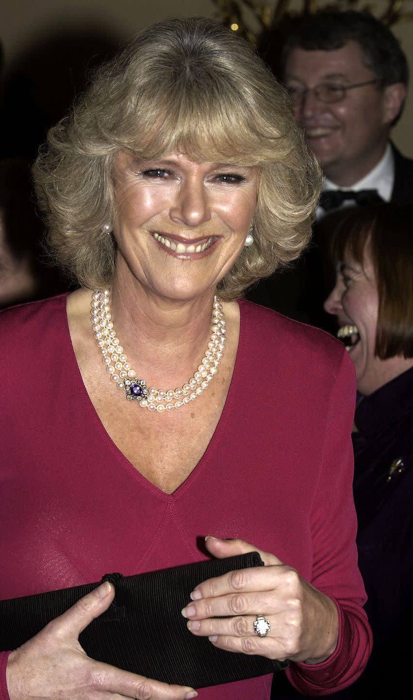 <p>Prince Charles proposed to Camilla with a diamond ring that was previously owned by his grandmother, the Queen Mother. It boasts a five-carat emerald-cut diamond in an Art Deco setting. It is believed to have been given to her after welcoming her first child, now the Queen.</p>