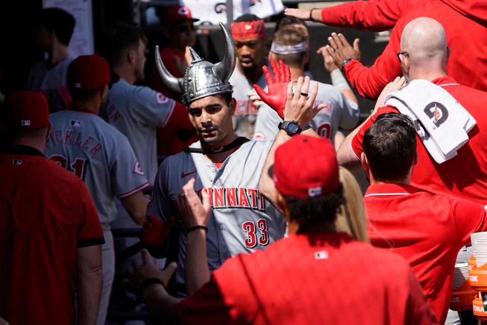 Christian Encarnacion-Strand celebrates his second homer of the season Sunday in the Reds' 11-4 victory over the Chicago White Sox. Encarnacion-Strand had two hits and drove in four runs as the Reds completed the three-game sweep.