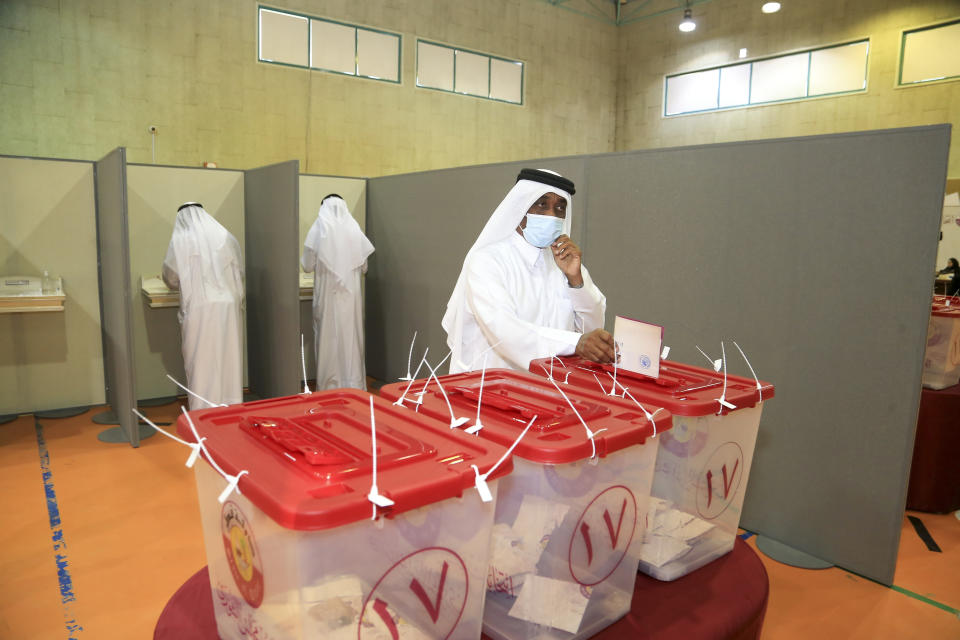 Qataris vote in legislative elections in Doha, Qatar, Saturday, Oct. 2, 2021. For the first time citizens will elect two-thirds of Shura council while emir will appoint the remaining 15 members. (AP Photo/Hussein Sayed)